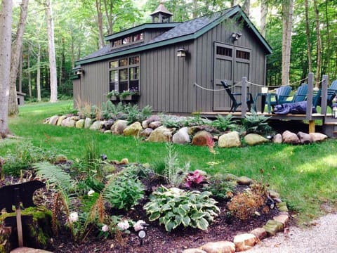 Bear's den nestled in a park-like setting on Mirror Lake Drive in Lake Placid.