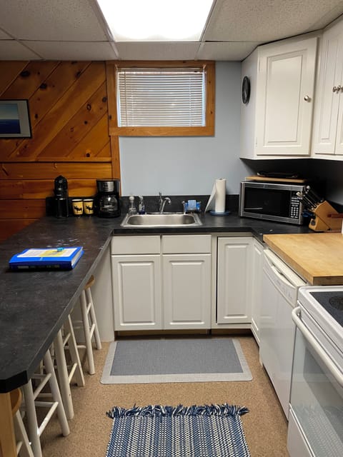 Kitchen with dining counter.