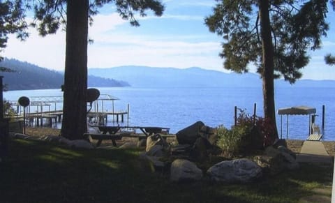 Amazing level beach with brand new dock, looking out from side of home 