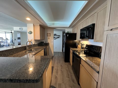 Fully equipped kitchen with granite countertops