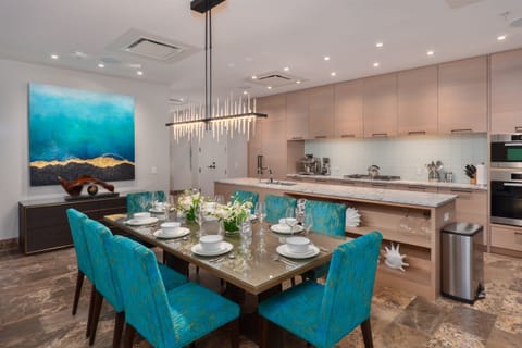 The artfully decorated dining area seats 8 guests