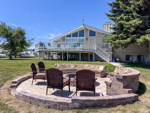Gather around the fire pit and enjoy spacious outdoor living near beautiful Bear Lake.