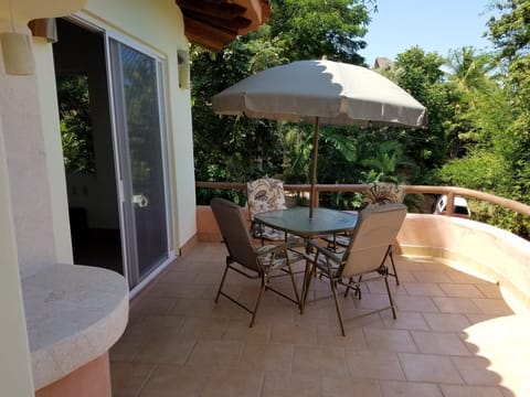 Terrace of Casita Molusco, the mollusk niche on left.