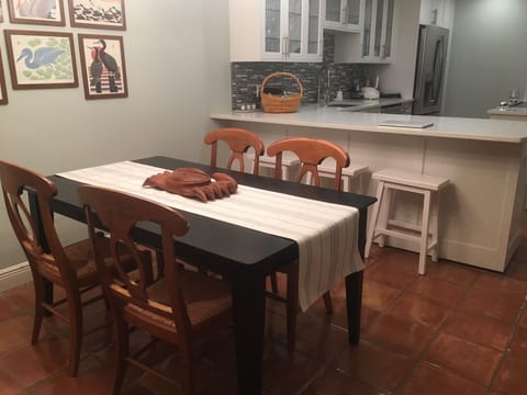 Dining area, and breakfast bar with stools