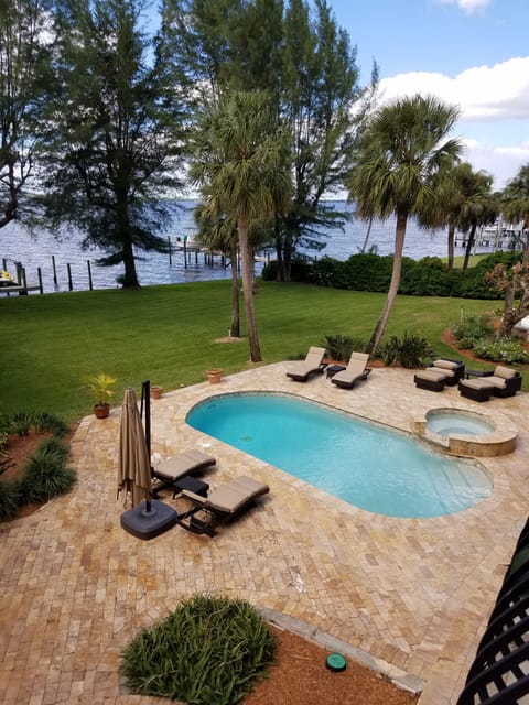 Enjoy waterfront swimming in the pool. 