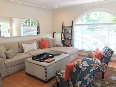 Overlook the park from your living room. Great natural light.