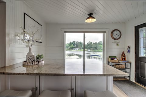 Spacious kitchen island seats 6 with beautiful view of the river.  