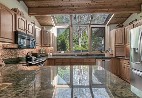 Large Kitchen with Granite counters and Fully Equipped utensils, pans etc.