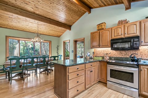 Kitchen and Dining area showing unique US Copper penny backsplash