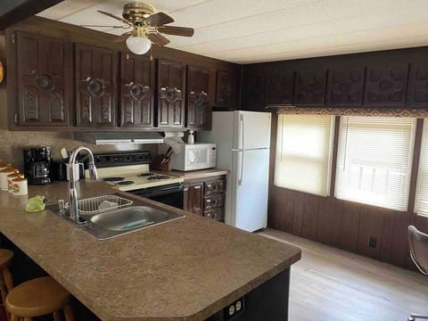 Full modern kitchen for you convenience Stocked with all the kitchen ware you will need Open to the living room for nice family conversation