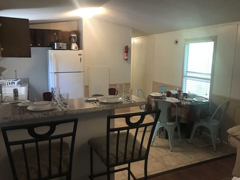 Two at the bar and a table for 4, Inn the Woods has place settings for 6+