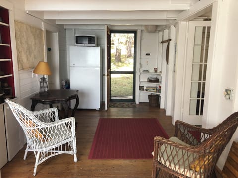 Entry hall from dining area, looking at front door