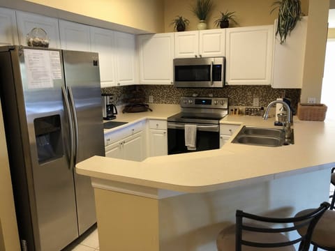 Fully equipped kitchen with all stainless steel appliances