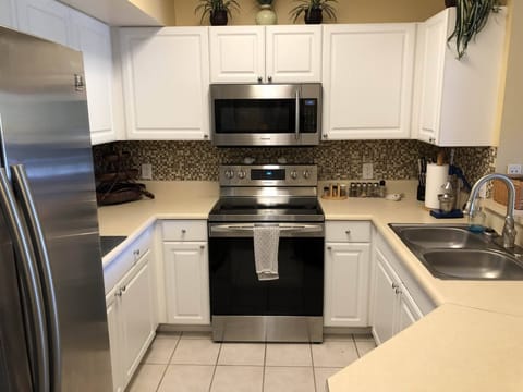 Fully equipped kitchen with all stainless steel appliances