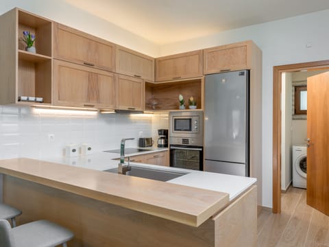 There is also a washing machine for your weekly needs!