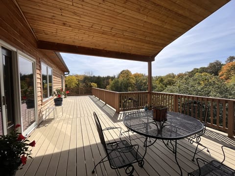 Back upper deck has a table and seating for 4. Faces West for beautiful sunsets.