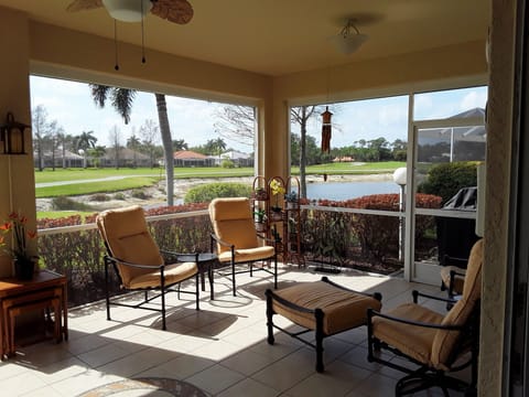 Lanai with golf course and pond view.
Pond is higher in summer & fall.