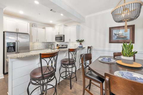 Dinging table and bar. Overlooking kitchen. 