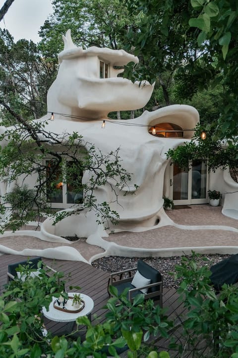 A full view of The Bloomhouse’s iconic, sculptural design and private outdoor living space.