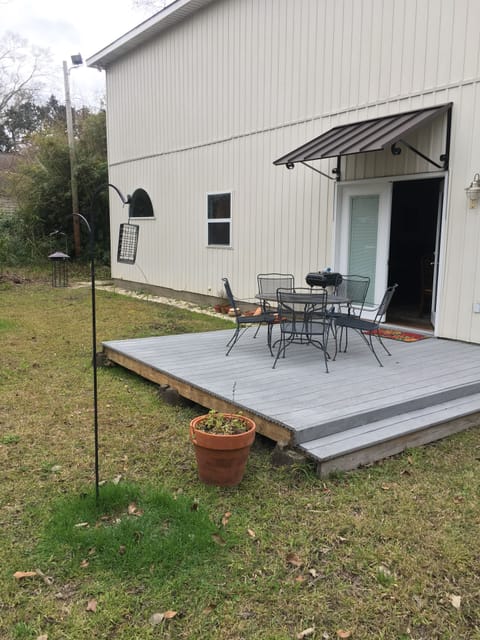 Rear entrance, yard  and patio deck