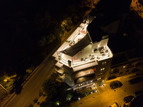 Aerial view of the property at night 