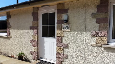 Entrance to The Croft from the gravelled parking area