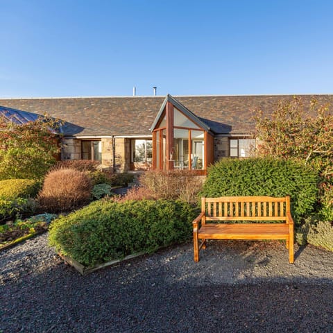 Admire the view from the cottage garden, 