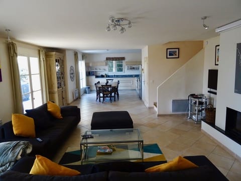 Huge living room with fully fitted kitchen at the far end