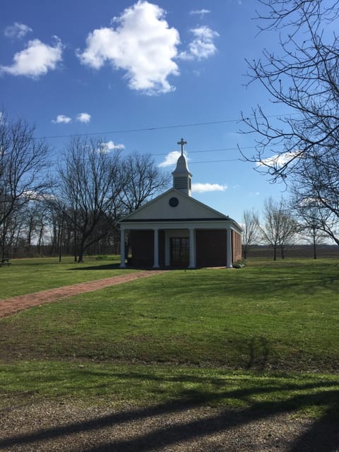 There is a small catholic church that has services on Saturday and Sunday.