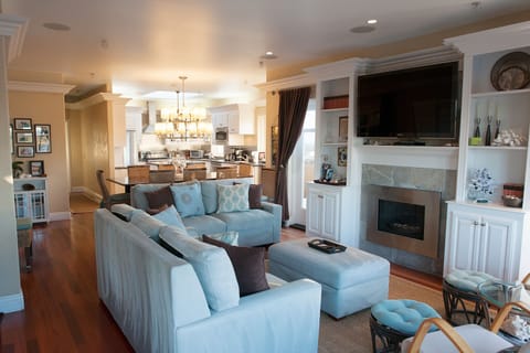 Right side of penthouses: larger living room, fireplace and Smart TV.