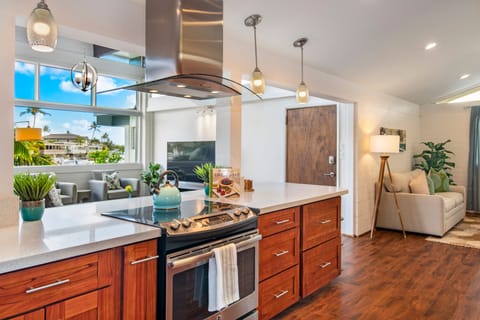 Stay connected with loved ones as the kitchen opens seamlessly into the living room, keeping everyone together.