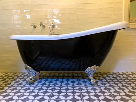 Relax in Inglenook's claw foot bathtub