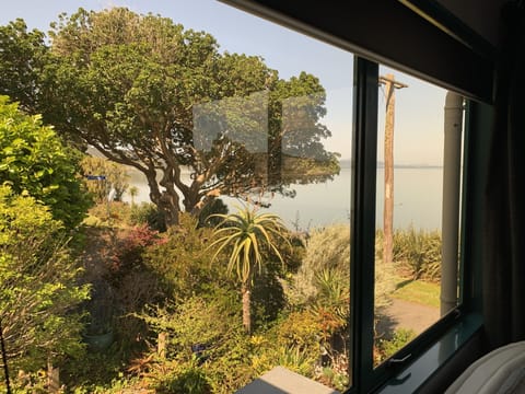 Garden and harbour views out side of master bedroom upstairs