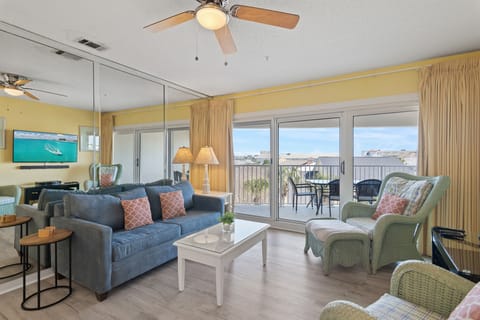 Relax on the sofa with the Gulf visible through the windows.