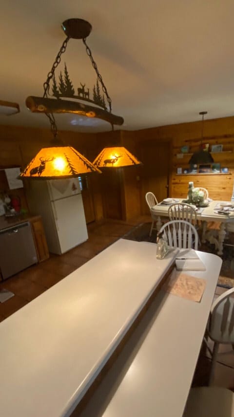 Breakfast Island and dining room table. Eat here…work here with plenty of space.