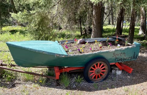 Seven Timbers boat with flowers at the entrance 
