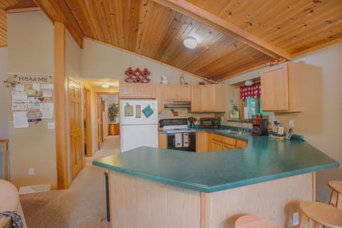 Eat In kitchen + hall to main floor bedrooms. 