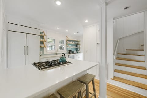 RENOVATED KITCHEN W/BAR SEATING FOR THREE