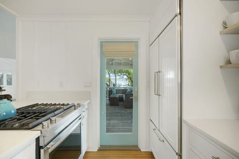 KITCHEN ALTERNATE VIEW FACING PORCH ACCESS