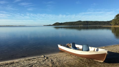 Jacaranda Beach House is located at Smiths Lake. Where the lake meets the ocean.