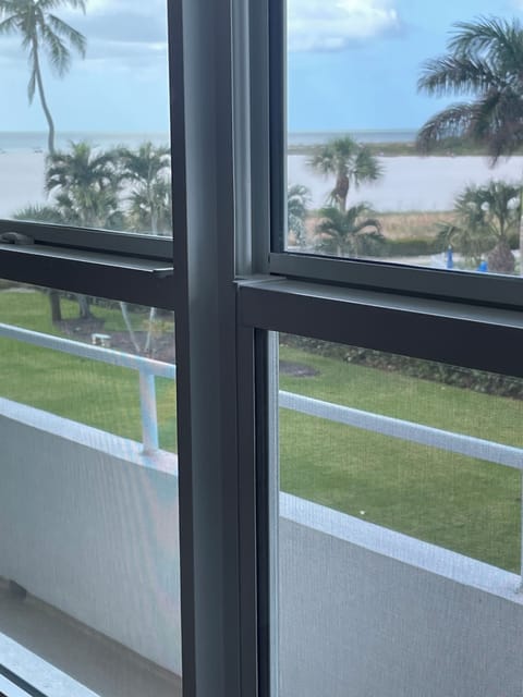 View of beach and Gulf from MBR king bed