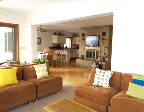 Play Wii or watch the game while enjoying the warmth of a wood burning fireplace