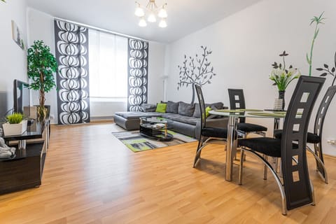 Living room with sofabed. dining table