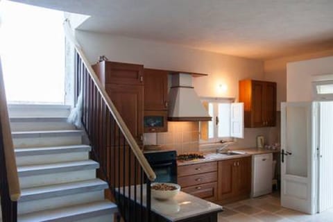 Internal stairs leading to the terrace.