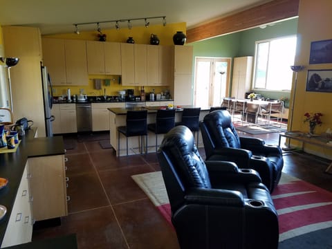 Living room, kitchen, & dining room.