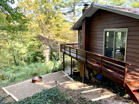 Back of House & driveway on KNOLLWOOD, with new firepit area (2020).
