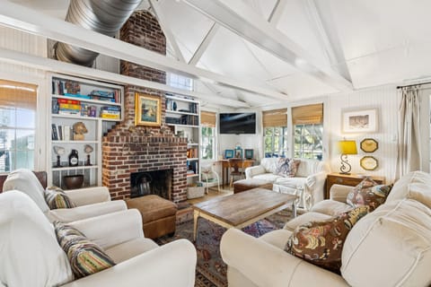 Room for the whole crew! Our cozy living room is designed for group movie nights, board games, and making memories after a long day at Folly Beach.