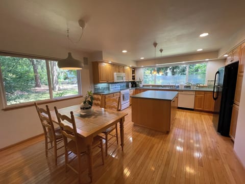 Full Kitchen with Island Prep Area, Full Size Fridge, Stove, Oven, Dish Washer