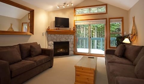 Living room with access to deck