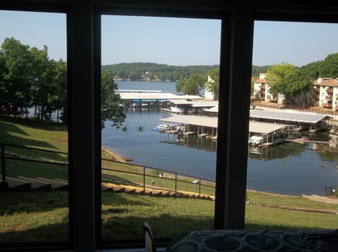 Floor to ceiling view of the lake from the master suite
